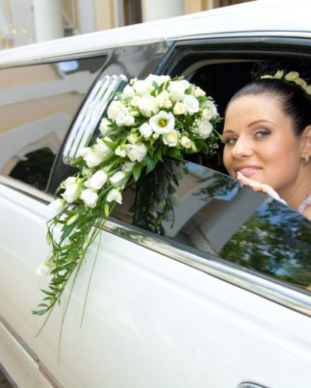 decorated white stretch wedding limo